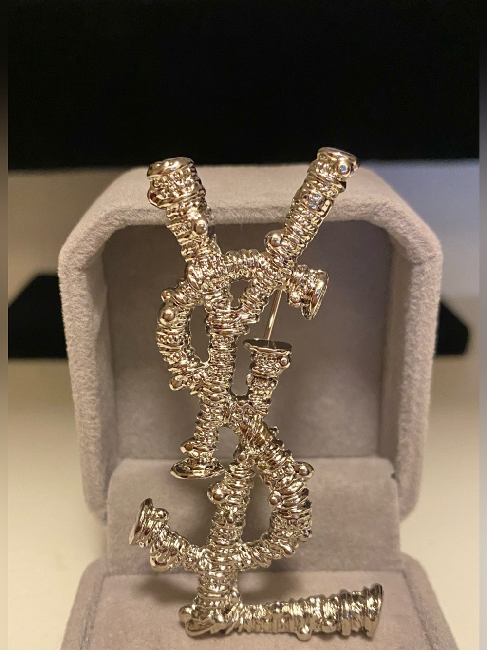 Yves Saint Laurent Silver -Tone Textured Monogram Brooch Unisex